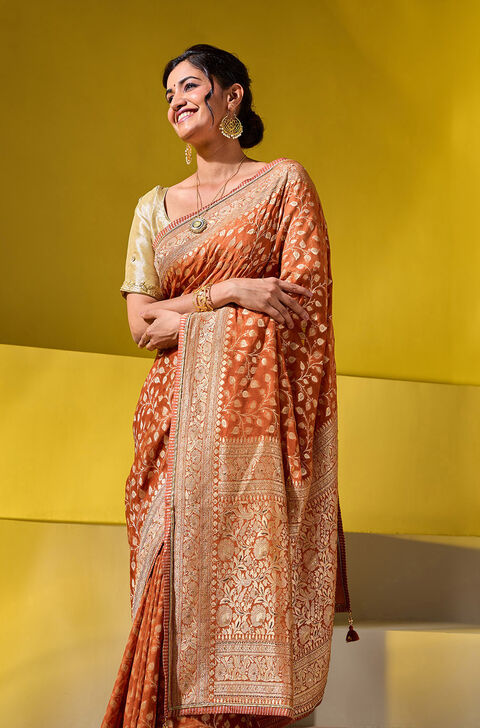 Orange Embroidered Pure Silk Georgette Saree