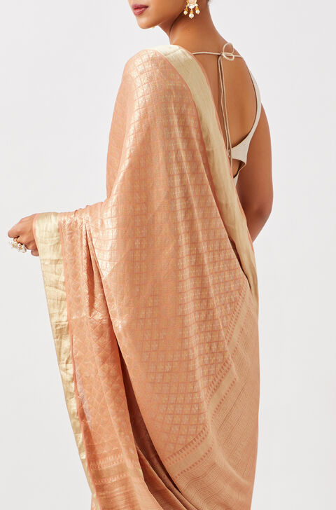 Light Orange Pure Georgette Woven Saree