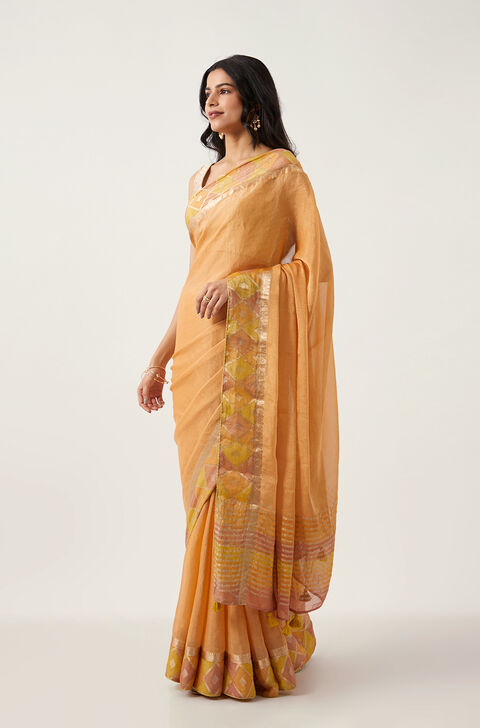 Light Orange Pure Georgette Tissue Woven Saree