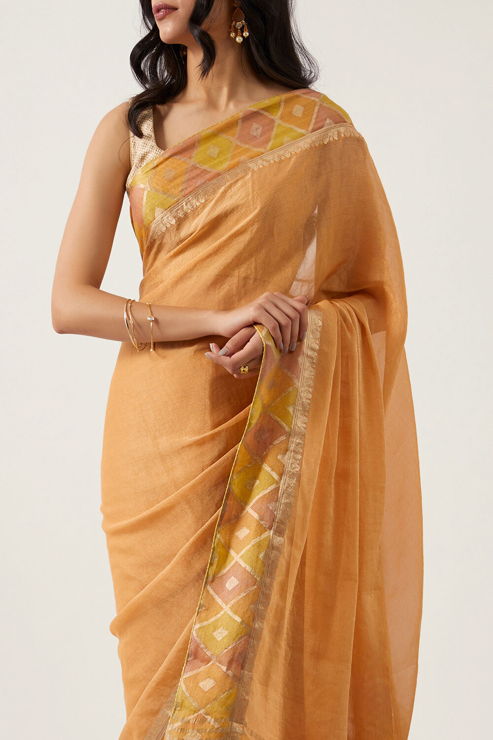 Light Orange Pure Georgette Tissue Woven Saree image number null
