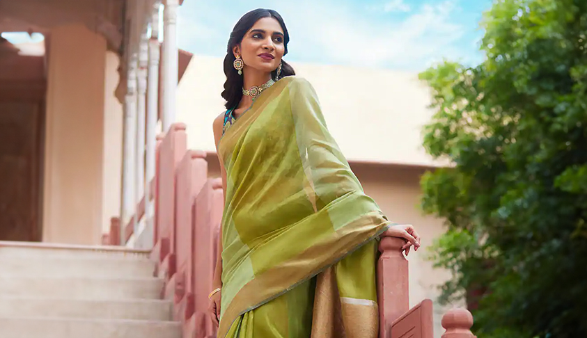 Contemporary Bridal Saree Look By Taneira